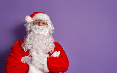 Santa Claus on color background.