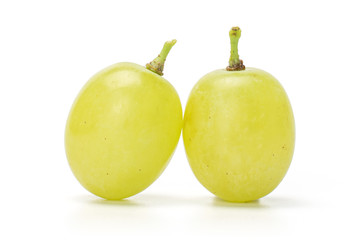 Group of two whole green table grapes isolated on white background