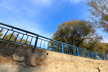 bridge railing under the blue sky