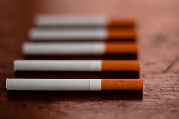 Cigarettes and red backgrounds feel unhealthy.