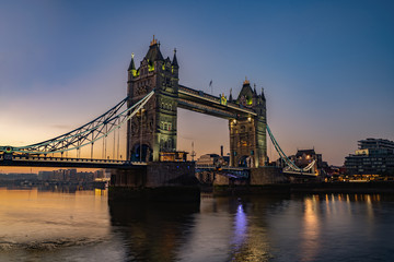 Fototapeta na wymiar London,Untied Kingdom iconic,Light trails along Tower Bridge traffic in the morning in London.