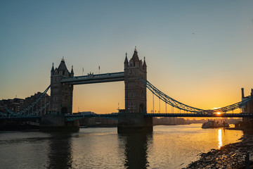 Fototapeta na wymiar London,Untied Kingdom iconic,Light trails along Tower Bridge traffic with sunrise in the morning in London.