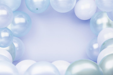 Fototapeta premium Turquoise background with balloons. Bright background for celebration.