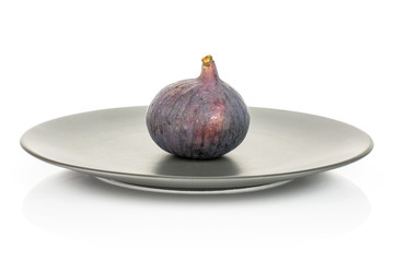 One whole fresh purple fig on gray ceramic plate isolated on white background
