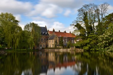 Naklejka na ściany i meble Houses in Bruges - Minnewater lake