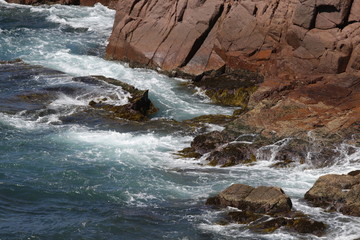 waves crashing on rocks