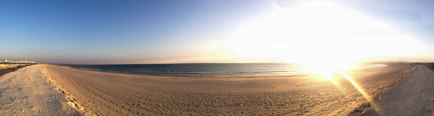 Fototapeta na wymiar Atlantic ocean panorama with the sand beach