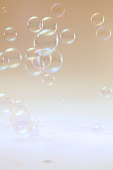 Rainbow soap bubbles on a background