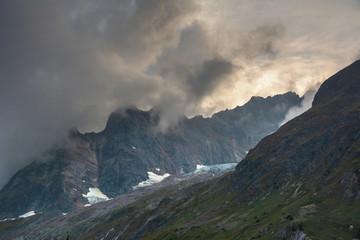 Obraz premium Wonderful views of the mountains in the Swiss Alps with backpackers.