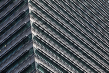 Kuala Lumpur, Malaysia &ndash; March 15, 2019. Huge facade of the skyscraper, glass, steel and concrete; downtown concept.