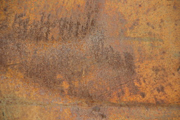 Еexture of rusty iron, cracked paint on an old metallic surface, sheet of rusty metal with cracked and flaky paint, abstract rusty metal texture. Horizontal