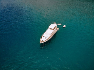 Bird eye view of the amazing white yacht in the Andaman sea; vessels concept.