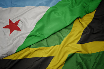 waving colorful flag of jamaica and national flag of djibouti.