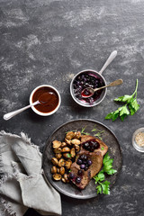 Beef with mushrooms and blueberry sauce