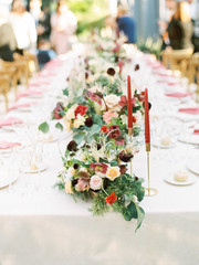 Table settings for a luxury wedding reception. Outdoor wedding