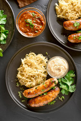 Stewed sauerkraut with grilled sausages