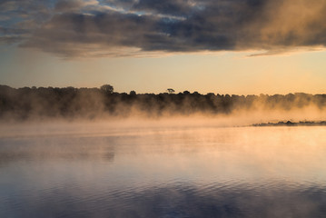 Hot lake in cold morning