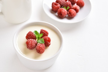Panna cotta with fresh raspberries