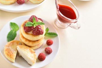 Cottage cheese pancakes with fresh raspberries