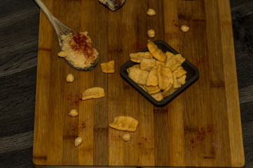 Photography of some chickpea chips with olive oil and paprika.