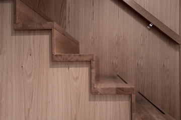 Closeup of wooden stairs, modern design , abstract brown emty interior, natural wooden stairs
