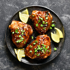 Sweet and spicy honey grilled chicken thighs © voltan