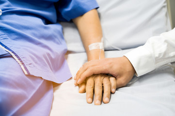 Doctor Holding hands Asian senior or elderly old lady woman patient with love, care, encourage and...