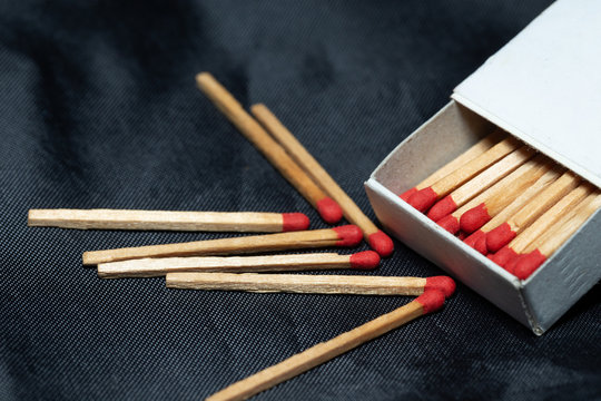 Wooden matches on a black background
