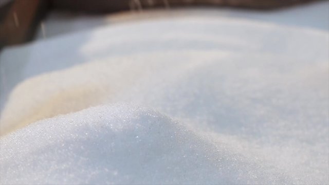 Polypropylene granules fall in slowmotion. Polypropylene granular raw materials