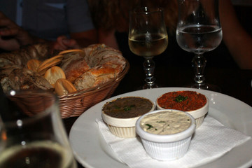 Three sauces, bread and wine