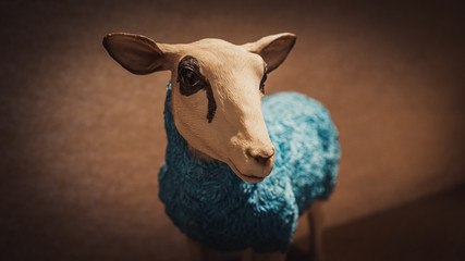 close up blue sheep statue decoration