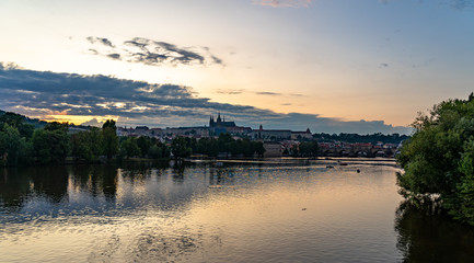 Scenic panorama cityscape view of Moldava river boat Prague in Czech Republic.