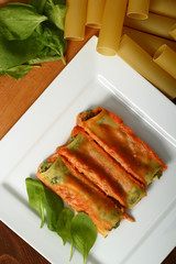 Cannelloni verdi. Pasta with spinach and ricotta.