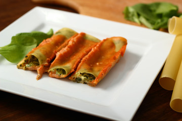 Cannelloni verdi. Pasta with spinach and ricotta.