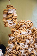 Bunches of bagels at the folk arts and crafts fair in Eastern Europe. Sushki, traditional Russian (also Ukrainian and Lithuanian) tea bread, vertical