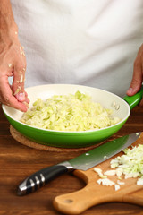 Fried Cabbage. Making. Transfer Cabbage to Frying Pan.