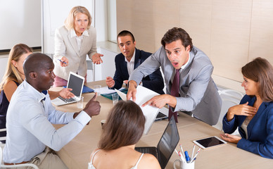 Business team having emotional discussion