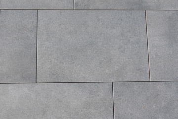 Naklejka premium gray floor tile background grey