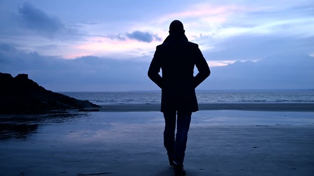 Man taking a walk at beach
