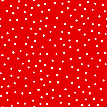Random scattered polka dot pattern, abstract red and white background, white dots on red.