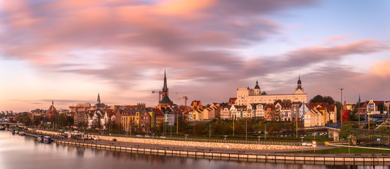 Szczecin visible from the entry route to the city in the light of sunrise.Poland - obrazy, fototapety, plakaty