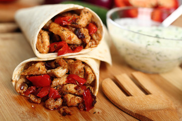 Making Tortilla with chicken and bell pepper. Series.