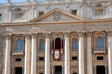 Façade of the Basilica of St. Peter in the Vatican, Rome. The entrance and the loggia where the...