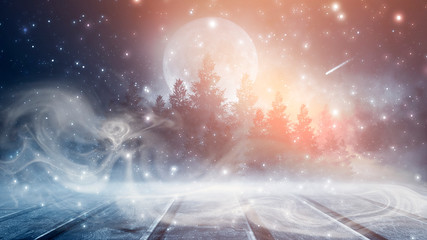 Night scene in the open. Snow, smog, moonlight. Winter background, snowy forest.
