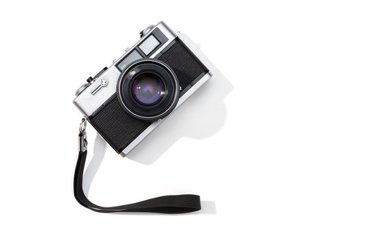 Flat lay film camera isolated on white background. Copy space