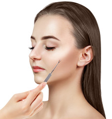 Mechanical cleaning of young female face with acne loop