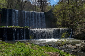 View of waterfall in river Bistritsa by village Pancharevo, place for tourism and travel in Vitosha...