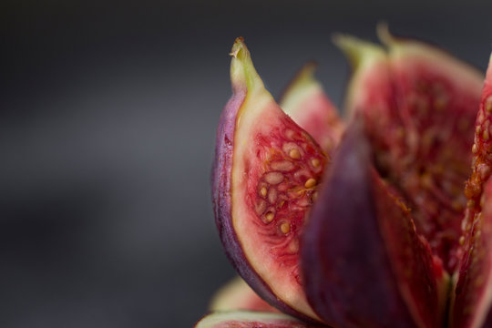 Macro Close-up Of Figs On The Dark Background