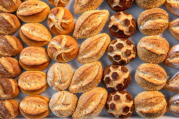 Bread buns diversity. Cute decorated bread rolls. Bavarian rolls