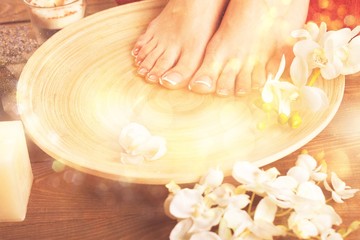 Plakat Spa and Wellness Setting with Female Feet on a Plate